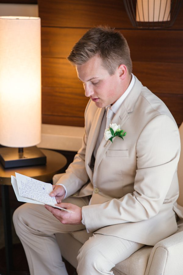 the groom reading his vows